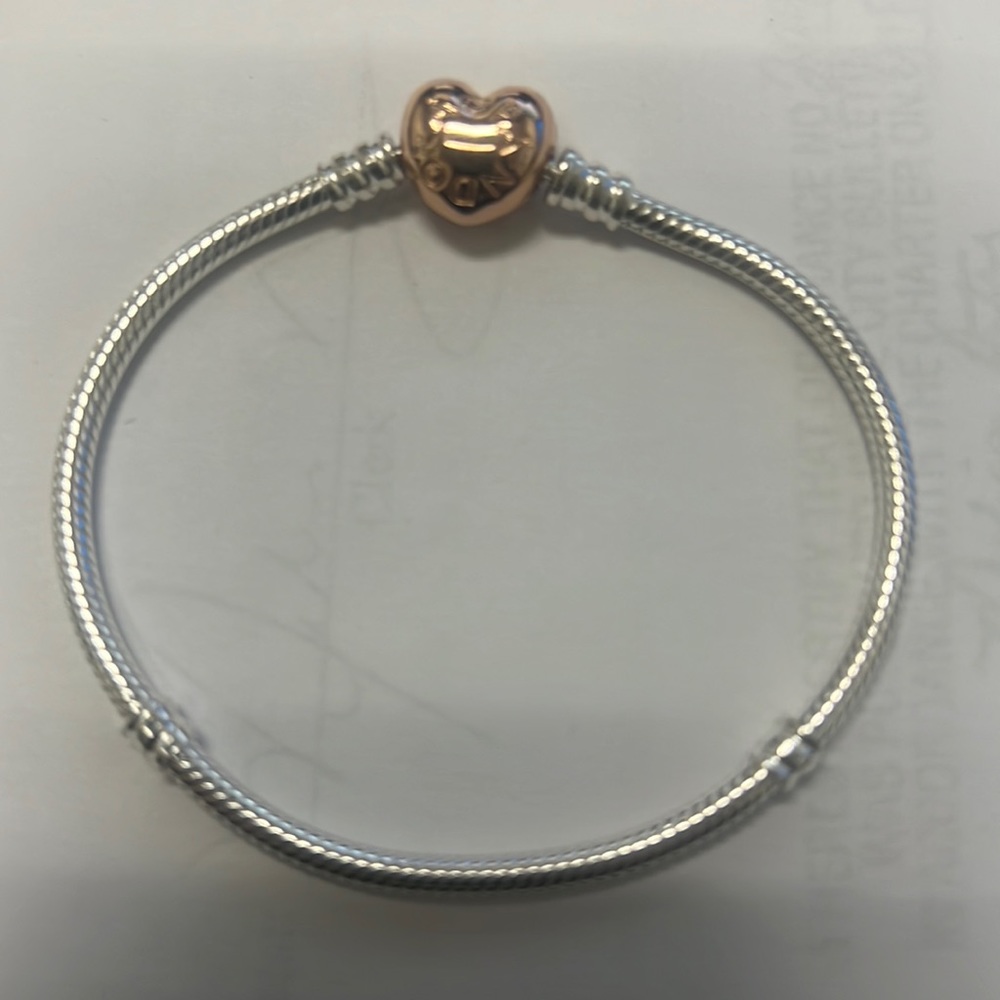 Pandora sterling bracelet 7 1/4 inches. Excellent used condition.